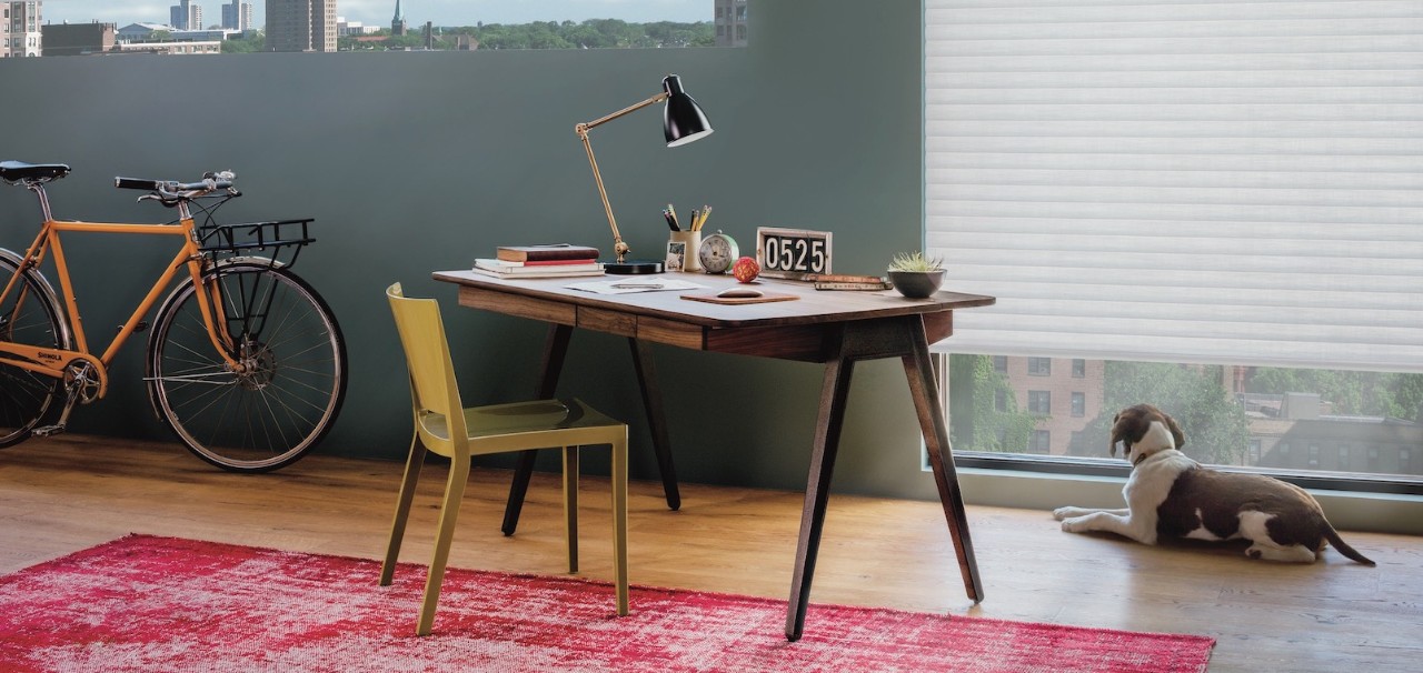 A room with a well-organized desk.